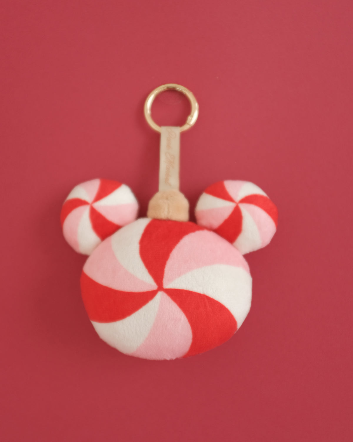 Back of the Peppermint Pal bag charm: the swirl continues all the way around, no face, like a classic ornament